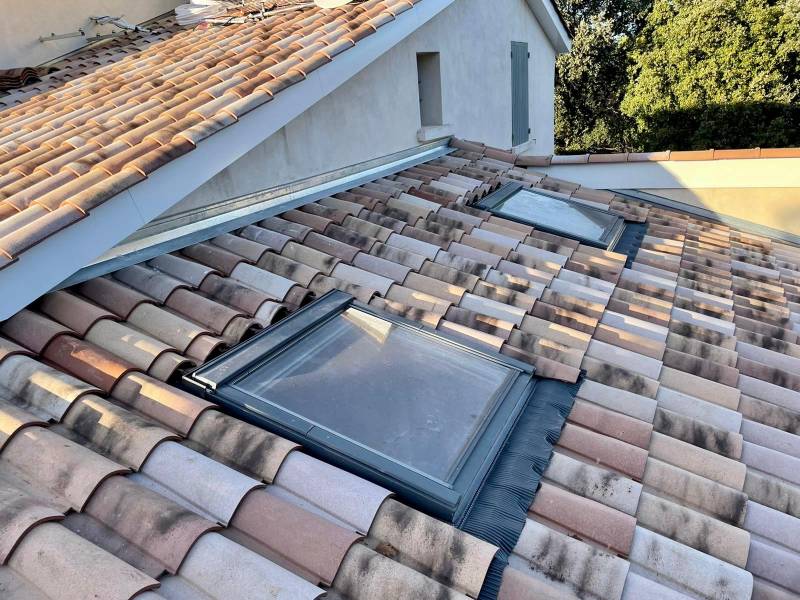 Optimisation thermique et remise en place des Velux S06 sur toiture rénovée à Craponne (69)