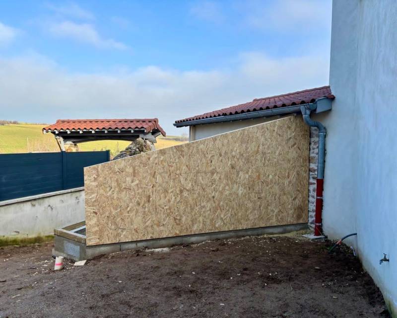Agrandissement d'une maison en ossature bois avec finition en bardage sur Lentilly (69)